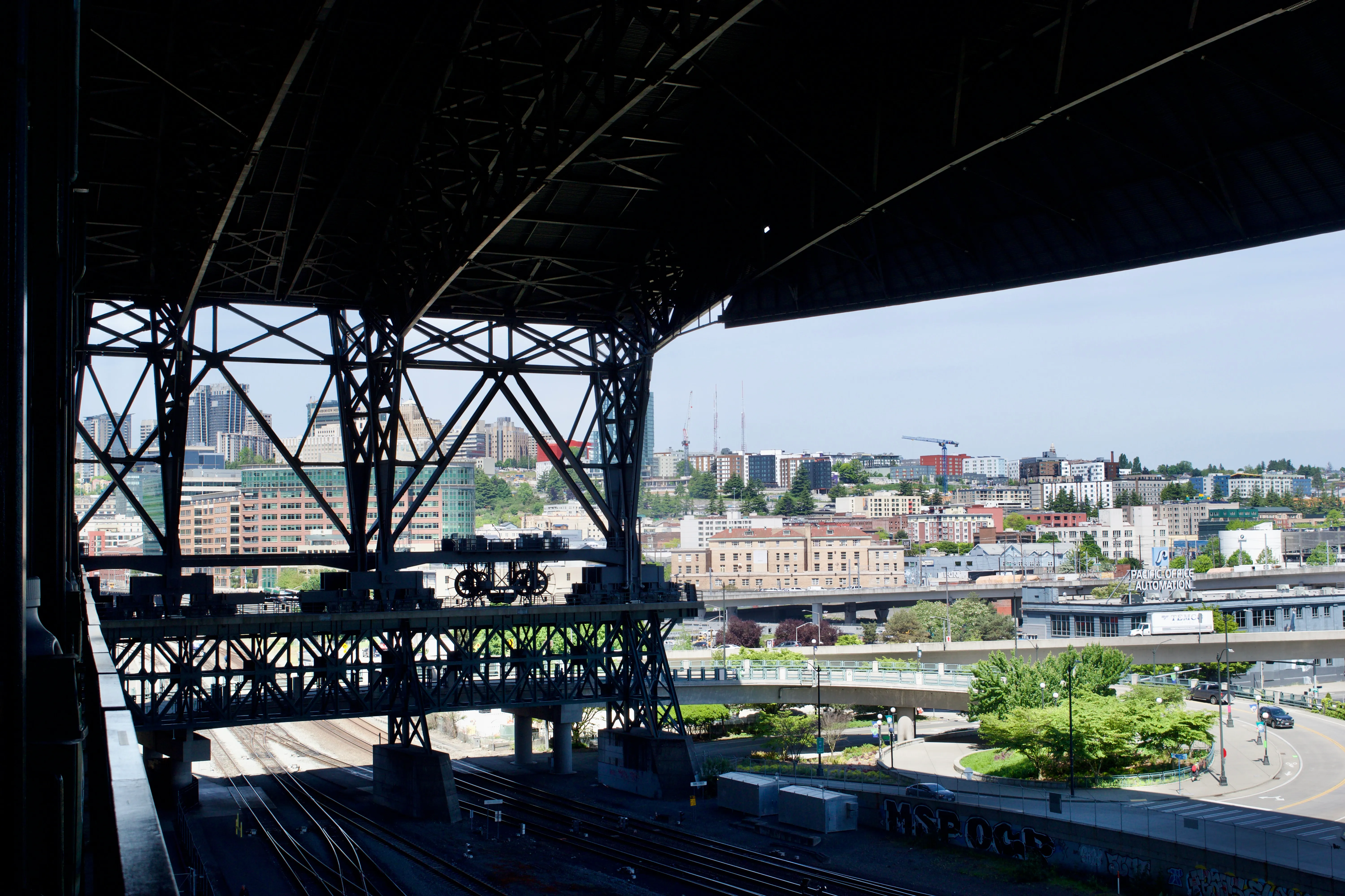 T-Mobile Park’s retractable roof hangs over the railway tracks next to the stadium