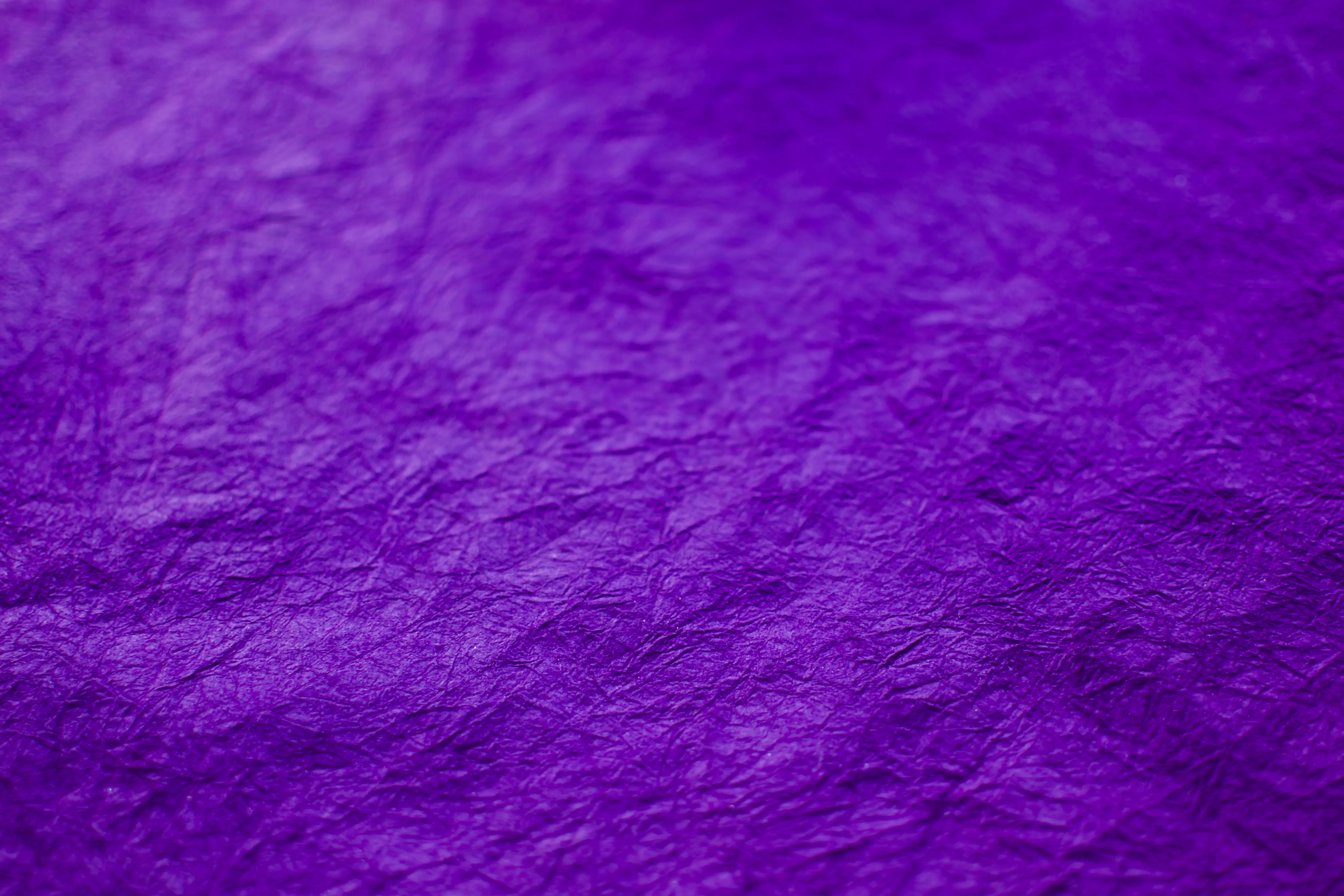 A closeup showing the texture and rich hue of washi dyed purple