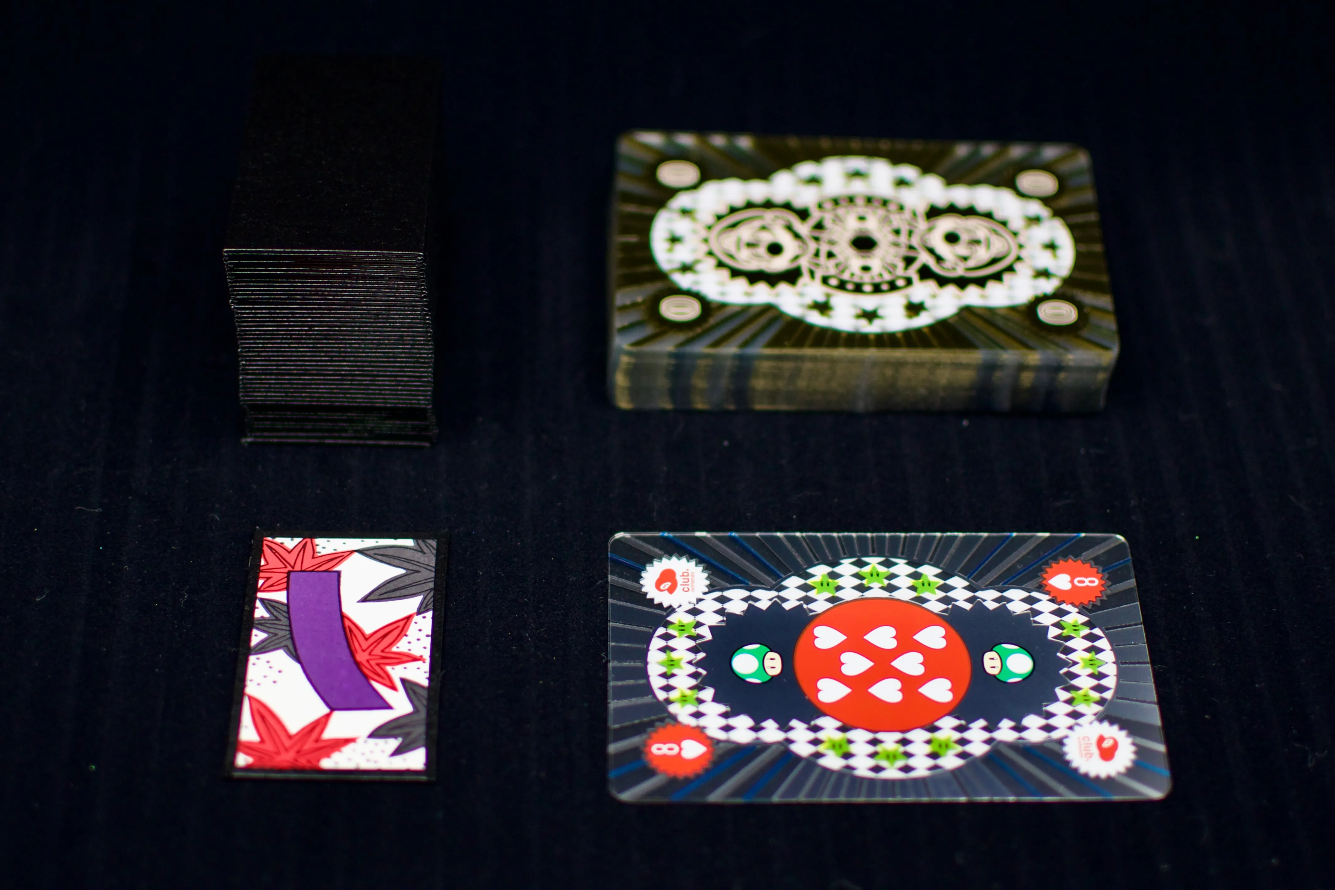 A hanafuda card next to a standard western playing card