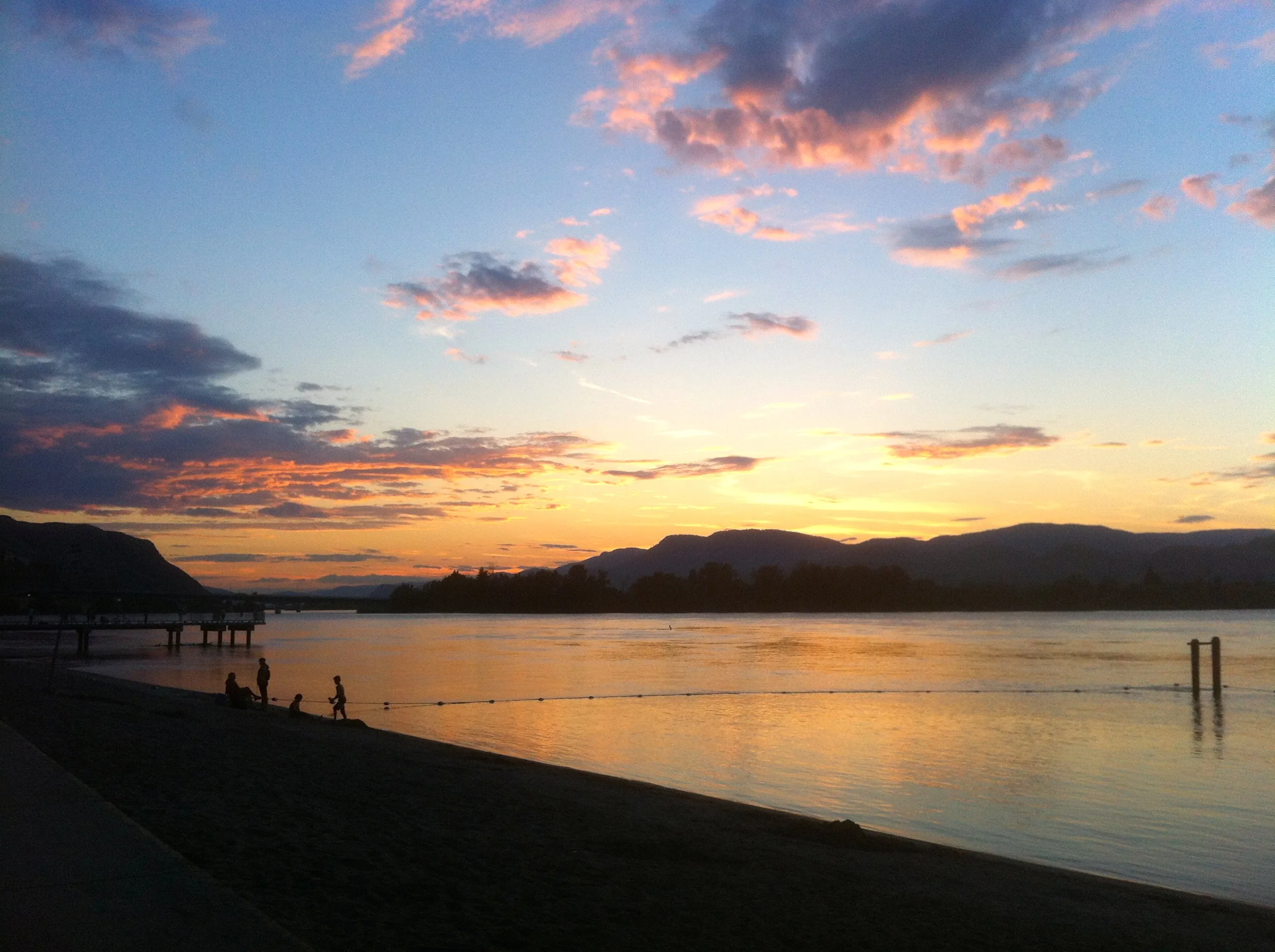 An orange and purple sunset over Snek’w7étkwe (Thompson River)