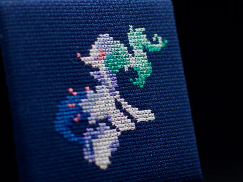 A cross-stitch of the Pokémon Primarina.