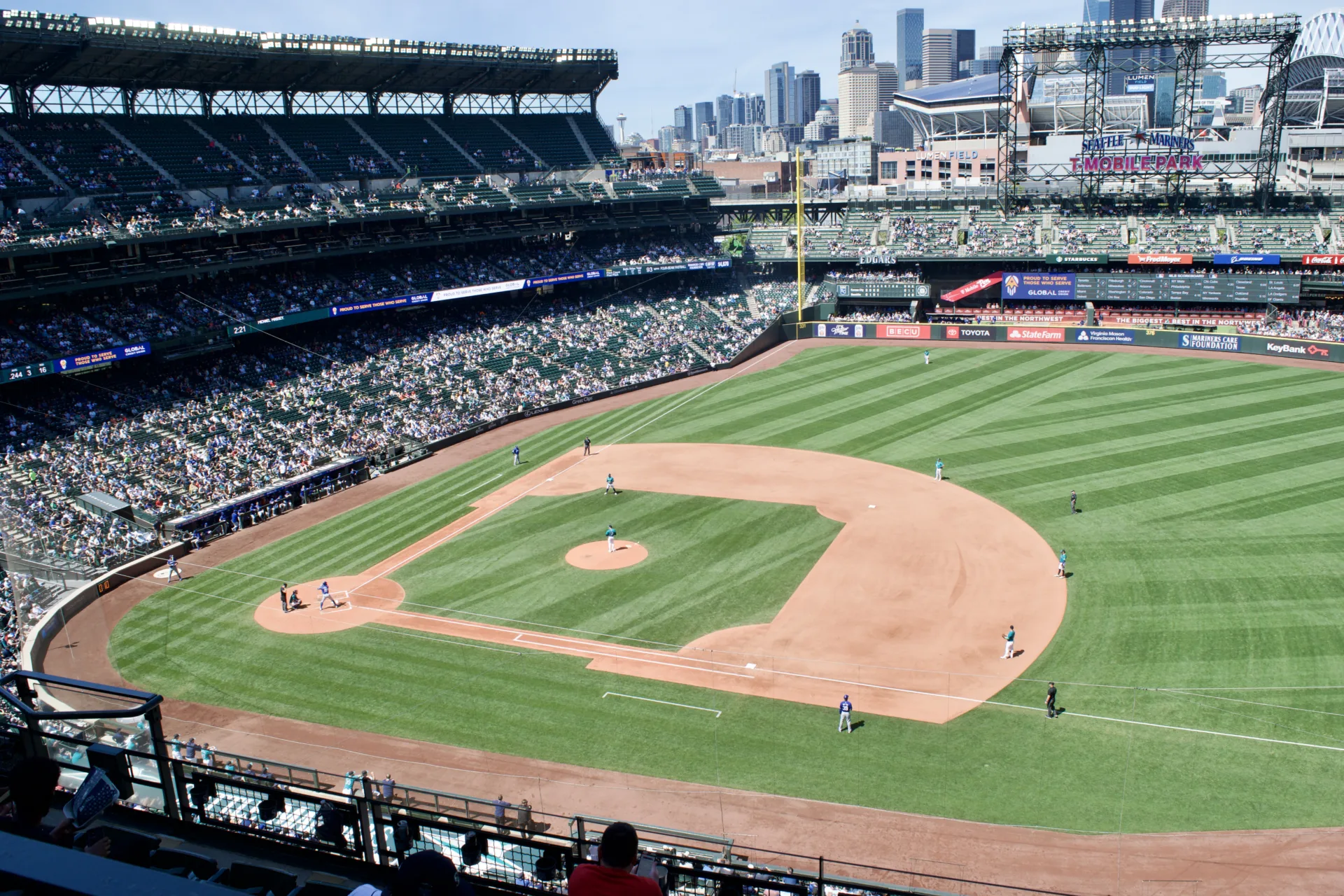 A top-down view of the baseball diamond from the stadium's upper level above first base.