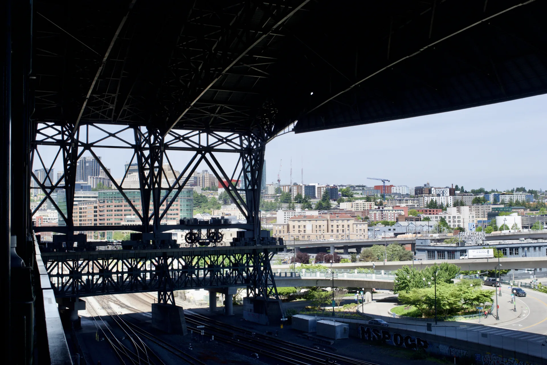 T-Mobile Park's retractable roof hangs over the railway tracks next to the stadium.