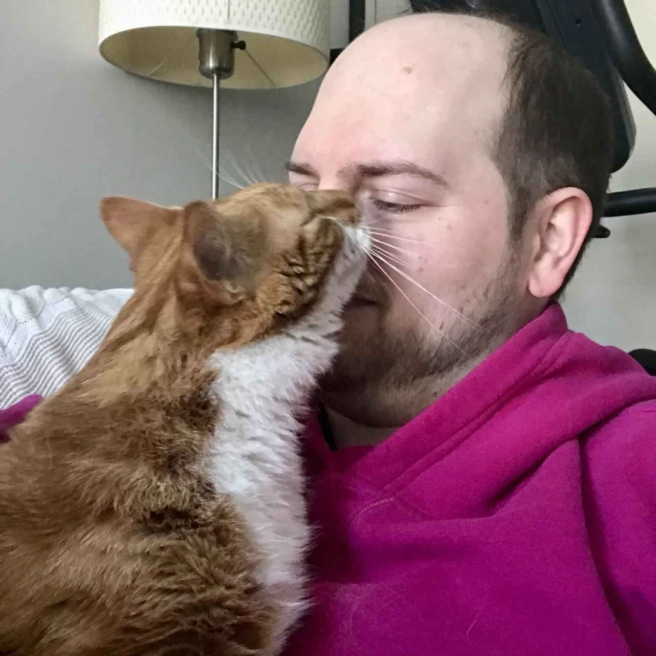 Diggy gets up close and nuzzles my nose and cheek as I snuggle him on the couch.